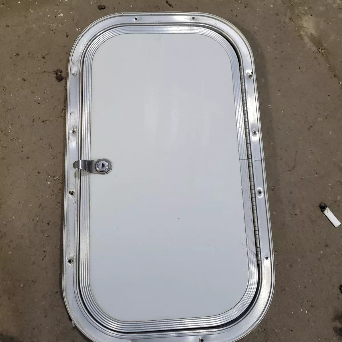Used Radius Cargo / compartment Door 19 3/4" X 10 3/4" X 1/2"D